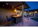 Evening view of patio with fire pit and pergola at 2806 N 82Nd St, Scottsdale, AZ 85257