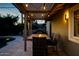 Patio with pergola, fire pit table, and pool view at 2806 N 82Nd St, Scottsdale, AZ 85257