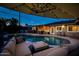 Relaxing poolside seating with patio umbrella at 2806 N 82Nd St, Scottsdale, AZ 85257