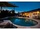 Stunning nighttime view of the pool and patio area at 2806 N 82Nd St, Scottsdale, AZ 85257