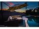 Evening view of the pool and patio furniture at 2806 N 82Nd St, Scottsdale, AZ 85257