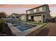 Stunning backyard oasis featuring a sparkling pool and spacious patio at 3045 E Bloomfield Pkwy, Gilbert, AZ 85296