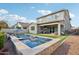 Private backyard with a sparkling pool, spa, and patio area at 3045 E Bloomfield Pkwy, Gilbert, AZ 85296