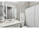 Clean bathroom with white vanity, shower, and toilet at 3045 E Bloomfield Pkwy, Gilbert, AZ 85296