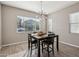 Dining area with table and chairs, abundant natural light at 3045 E Bloomfield Pkwy, Gilbert, AZ 85296