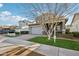 Two-story home with gray exterior, double garage, and landscaped yard at 3045 E Bloomfield Pkwy, Gilbert, AZ 85296