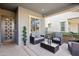 Cozy front porch with stylish seating and modern door at 3045 E Bloomfield Pkwy, Gilbert, AZ 85296
