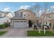 Beautiful two-story home with a welcoming front porch and attached two-car garage at 3045 E Bloomfield Pkwy, Gilbert, AZ 85296