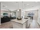 Spacious kitchen with island, stainless steel appliances, and granite countertops at 3045 E Bloomfield Pkwy, Gilbert, AZ 85296