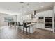 Bright kitchen with white cabinets, granite counters, and stainless steel appliances at 3045 E Bloomfield Pkwy, Gilbert, AZ 85296
