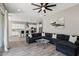 Spacious living room with open floor plan and kitchen view at 3045 E Bloomfield Pkwy, Gilbert, AZ 85296