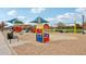 Playground with swings and play structures at 3045 E Bloomfield Pkwy, Gilbert, AZ 85296
