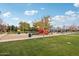playground with swings and play structures at 3045 E Bloomfield Pkwy, Gilbert, AZ 85296