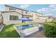 Private backyard retreat with a sparkling pool, spacious patio, and lush greenery at 3045 E Bloomfield Pkwy, Gilbert, AZ 85296