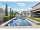Relaxing pool and spa with stone accents and lush landscaping at 3045 E Bloomfield Pkwy, Gilbert, AZ 85296
