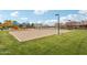 Sand volleyball court with surrounding green space at 3045 E Bloomfield Pkwy, Gilbert, AZ 85296