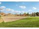 Sand volleyball court with park amenities nearby at 3045 E Bloomfield Pkwy, Gilbert, AZ 85296