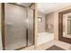 Bathroom with a shower and soaking tub at 36601 N Mule Train Rd # B19, Carefree, AZ 85377
