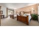 Guest bedroom with two twin beds and access to a patio at 36601 N Mule Train Rd # B19, Carefree, AZ 85377