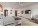 Spacious bedroom with king-size bed and views of the bathroom and kitchen at 36601 N Mule Train Rd # B19, Carefree, AZ 85377