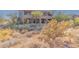 View of home from the desert landscape at 36601 N Mule Train Rd # B19, Carefree, AZ 85377