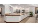 Updated kitchen with ample counter space and white cabinetry at 36601 N Mule Train Rd # B19, Carefree, AZ 85377