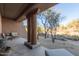 Covered patio with desert landscaping views at 36601 N Mule Train Rd # B19, Carefree, AZ 85377