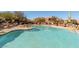Inviting community pool with ample lounge space at 36601 N Mule Train Rd # B19, Carefree, AZ 85377