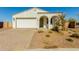 New construction home with front yard landscaping and two-car garage at 37692 N Bridlewood Ln, San Tan Valley, AZ 85140