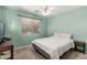 Guest bedroom with a double bed and light-green walls at 4132 E Amarillo Dr, San Tan Valley, AZ 85140