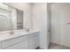 Clean bathroom with double vanity and walk-in shower at 4930 S 105Th Ln, Tolleson, AZ 85353
