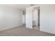 Bedroom with adjacent bathroom and hallway access at 4930 S 105Th Ln, Tolleson, AZ 85353