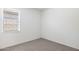 Empty bedroom with carpet and window at 4930 S 105Th Ln, Tolleson, AZ 85353