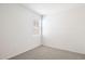 Small bedroom with carpet and a window at 4930 S 105Th Ln, Tolleson, AZ 85353