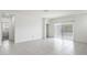 Bright hallway with tile flooring and doors to other rooms at 4930 S 105Th Ln, Tolleson, AZ 85353