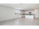 Modern kitchen featuring white cabinets and granite countertops at 4930 S 105Th Ln, Tolleson, AZ 85353