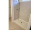 Clean shower with tile surround and a single-handle shower faucet at 4930 S 105Th Ln, Tolleson, AZ 85353
