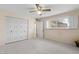 Bedroom with double door closet and window shutters at 5891 E Thomas Rd, Scottsdale, AZ 85251