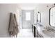 Modern bathroom with double vanity and marble shower at 6140 E Calle Tuberia --, Scottsdale, AZ 85251