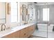 Luxury bathroom with double vanity, soaking tub, and glass shower at 6140 E Calle Tuberia --, Scottsdale, AZ 85251