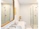 Spa-like bathroom with marble tile, double vanity, and walk-in shower at 6140 E Calle Tuberia --, Scottsdale, AZ 85251