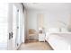Light and airy bedroom with french doors and white bedding at 6140 E Calle Tuberia --, Scottsdale, AZ 85251
