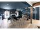 Elegant dining room features a dark wood table, chandelier, and herringbone floors at 6140 E Calle Tuberia --, Scottsdale, AZ 85251