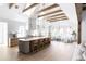 Elegant kitchen with large island, high-end appliances, and breakfast bar at 6140 E Calle Tuberia --, Scottsdale, AZ 85251