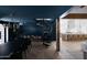 Open concept kitchen and dining area with modern finishes and a spiral staircase at 6140 E Calle Tuberia --, Scottsdale, AZ 85251