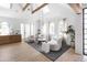 Spacious living area with vaulted ceiling, exposed wooden beams, and stylish furniture at 6140 E Calle Tuberia --, Scottsdale, AZ 85251