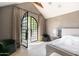 Main bedroom with arched French doors opening to a private patio at 6140 E Calle Tuberia --, Scottsdale, AZ 85251