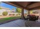 Spacious covered patio overlooking the backyard at 6216 W Morrow Dr, Glendale, AZ 85308