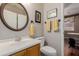 Small bathroom with single sink vanity and toilet at 6216 W Morrow Dr, Glendale, AZ 85308