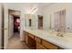 Double sink bathroom vanity with a mirror at 6216 W Morrow Dr, Glendale, AZ 85308